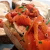 Classic creamy cashew vegan cheese by Mouse's Favourite on toast with carrot lox, chives and black pepper